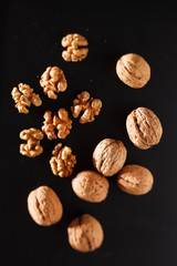 walnuts on black background