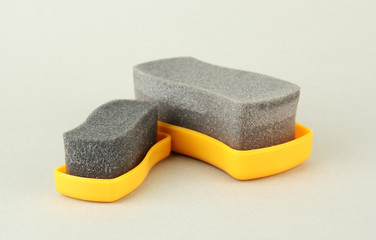 Shoe shine sponges, on color background