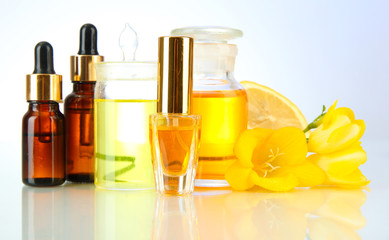 Bottles with ingredients for the perfume, isolated on white
