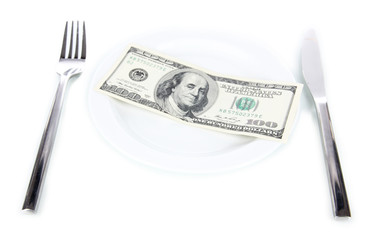Money on plate isolated on white