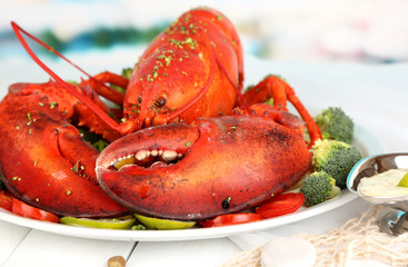 Red lobster on platter on serving table close-up