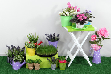 Color crate and table with decorative elements and flowers