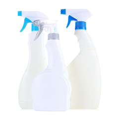 Different kinds of sprays for house cleaning, isolated on white