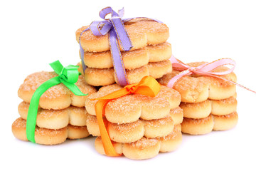 Sweet cookies tied with colorful ribbons isolated on white