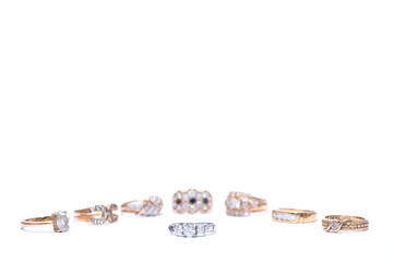 silver wedding ring in the middle of jewelry gold wedding rings