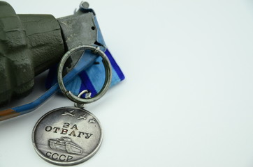 medal and grenade