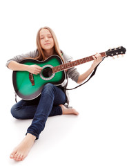Obraz premium Beautiful girl with guitar on white background