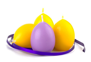 Colorful Easter candles  isolated on white background