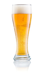 Glass of fresh beer with foam isolated on a white background