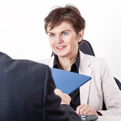 Boss talking to candidates