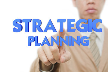 Young business man use hand drawing business word