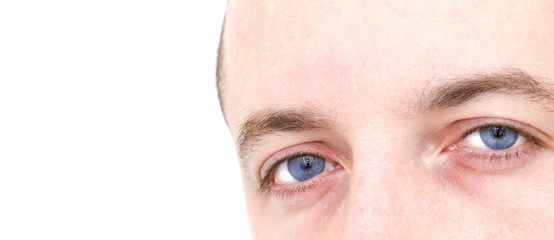 close of man with blue eyes on white