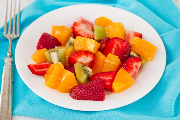 fruit salad on white plate