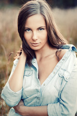 Naklejka premium Young beautiful woman outdoor summer\spring portrait
