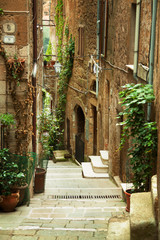 Old town alley in Tuscany Italy
