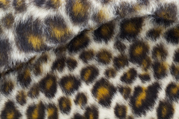 close up shot of fake leopard tiger fur texture background