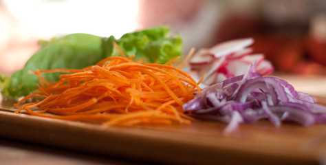 Organic salad with carrot, onion, radish and lettuce salad