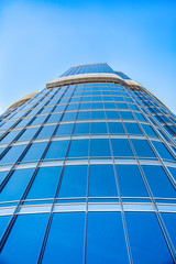 Fototapeta na wymiar modern blue szklane ściany wieżowca