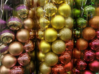 Multicolor Christmas and New Year decorative balls in containers