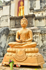 Statue of golden ancient Buddha in Temple THAILAND
