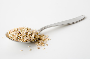 Löffel mit zarten Haferflocken