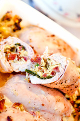 detail chicken roll with eggs, spinach and bacon