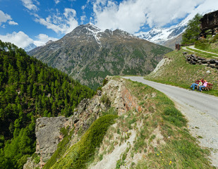 Family  on summer Alps mountain