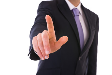 Businessman touching an imaginary screen.