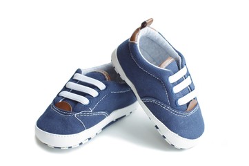 Babies shoes on white background