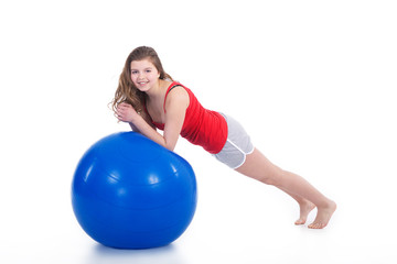 Fototapeta premium Mädchen macht Gymnastik mit Ball Porträt