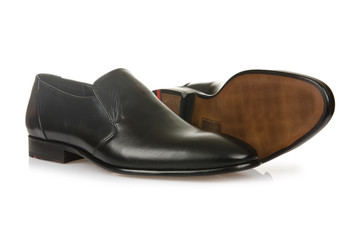Fashion concept with male shoes on white