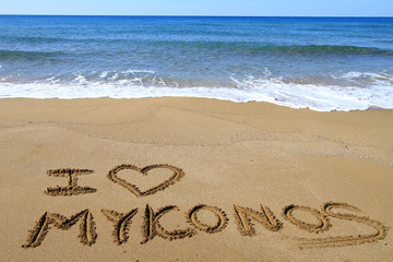 I Love Mykonos written on sandy beach - obrazy, fototapety, plakaty