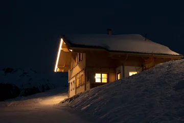 Foto op Canvas Beautiful skiing hut at night © Frank Gärtner