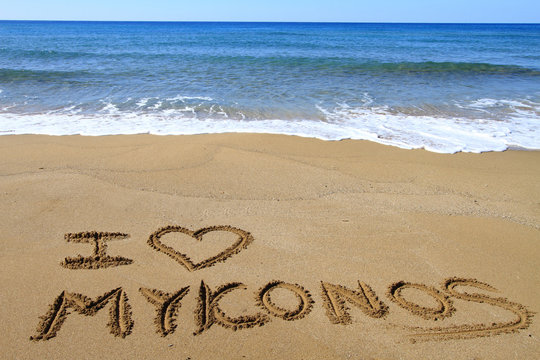 I Love Mykonos written on sandy beach