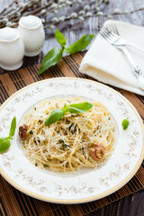 pasta with grated Parmesan cheese and walnuts