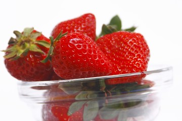 Tasty strawberry in glass bowl