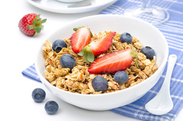 breakfast with homemade granola and fresh berries