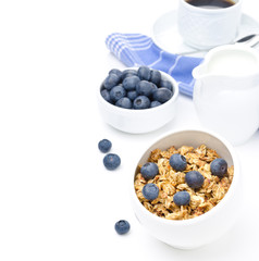 breakfast with homemade granola, blueberries and black coffee