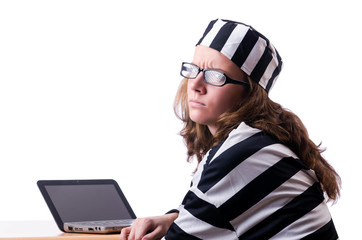 Criminal hacker with laptop on white