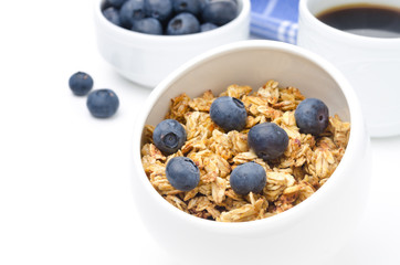 homemade granola with fresh blueberries closeup