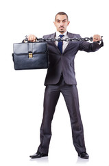 Businessman with shackles on white