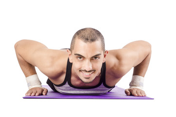 Man doing exercises on white