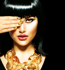 Beauty Brunette Egyptian Woman.Golden Accessories
