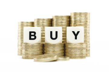 BUY on gold coins on white background