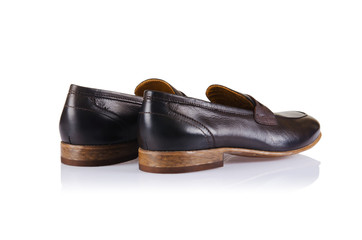 Fashion concept with male shoes on white