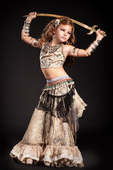 Little girl bellydancer dancing