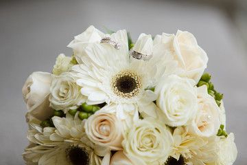 Wedding bouquet and rings