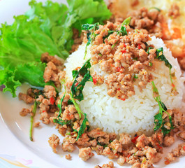 Fried pork with sweet basil and whit basi, Thai food