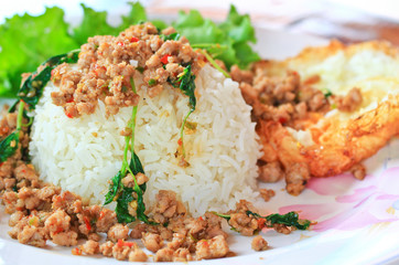 Fried pork with sweet basil and whit basi, Thai food