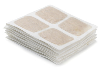 Stack of warm mustard plasters